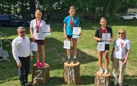 Lena z brązowym medalem na podium