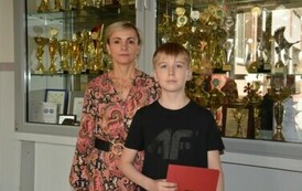 Szymon Myśliwiec &ndash; finalista konkursu z matematyki z opiekunem &ndash; panią Ewą Kowalską