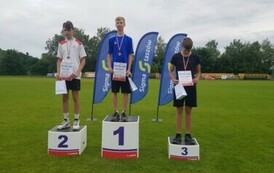 Adam Krawiecki na podium