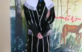 Uczeń w historycznym stroju