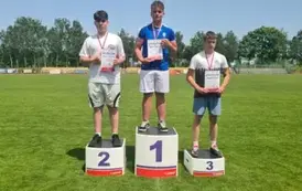 Denis Tomasik na podium